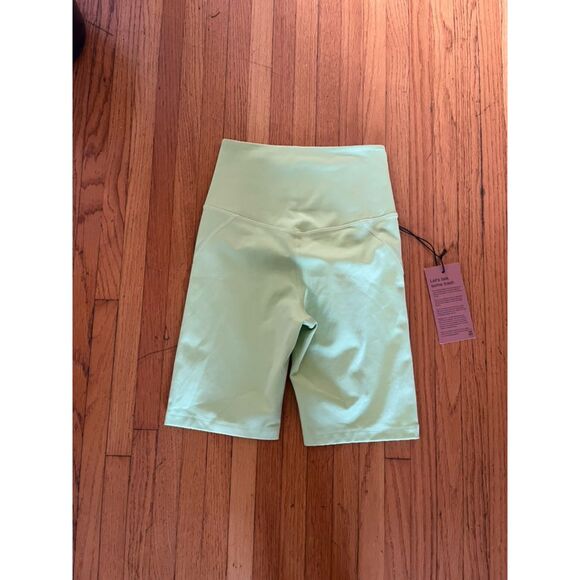 NWT Girlfriend Collective High Rise Bike Shorts in Butterfly Neon Green - Picture 2 of 3